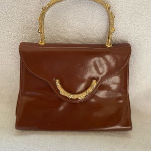 Cute vintage handbag, metal handle milk chocolate color leather,gently used,